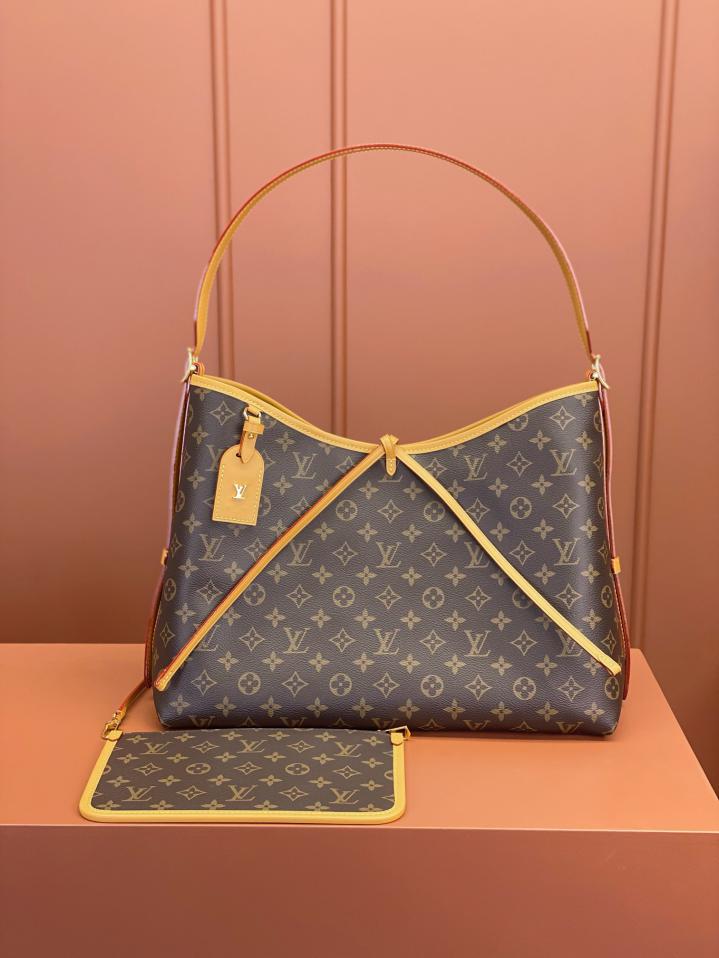 Louis Vuitton Alma Carryall MM in Tela Monogram