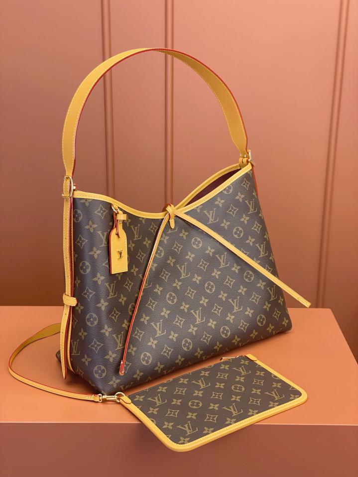 Louis Vuitton Alma Carryall MM in Tela Monogram