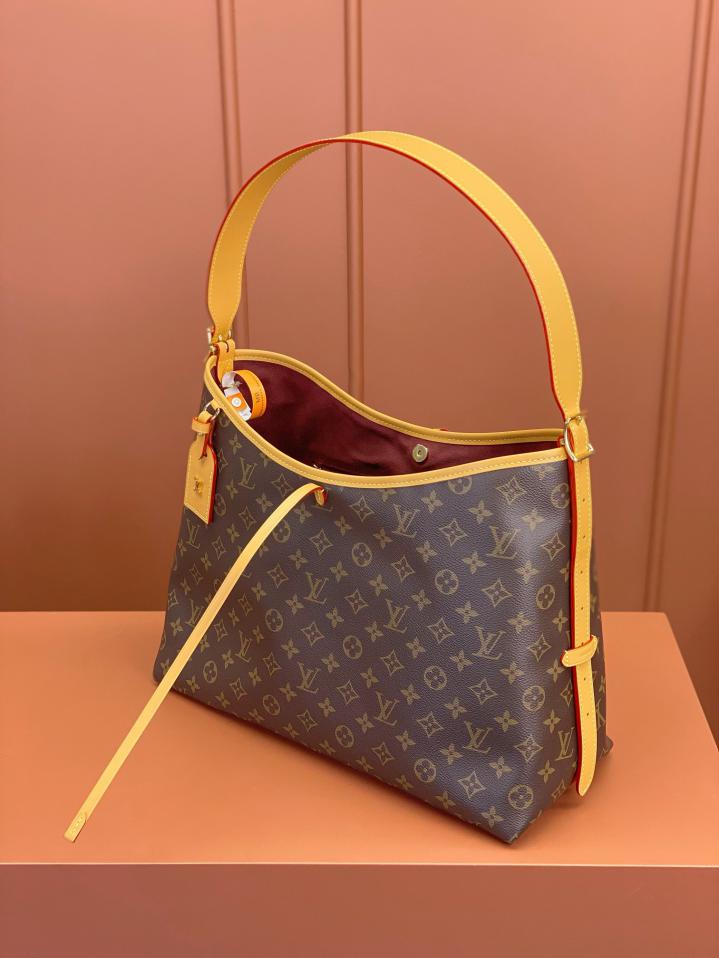 Louis Vuitton Alma Carryall MM in Tela Monogram