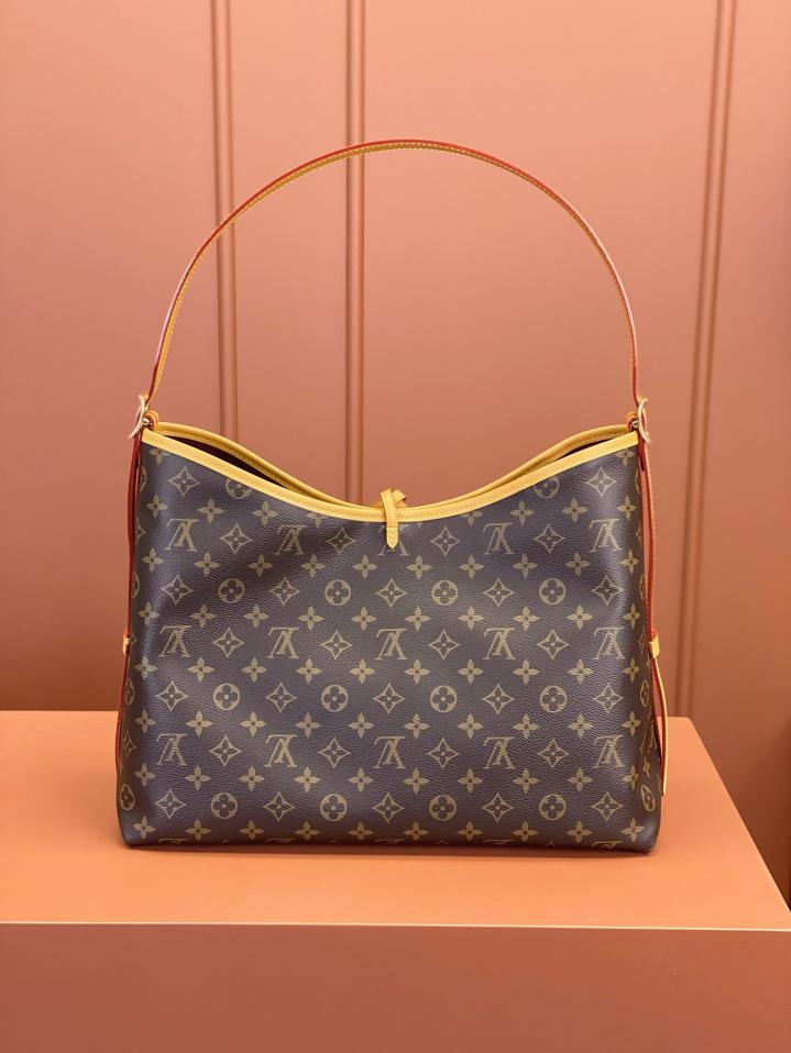 Louis Vuitton Alma Carryall MM in Tela Monogram