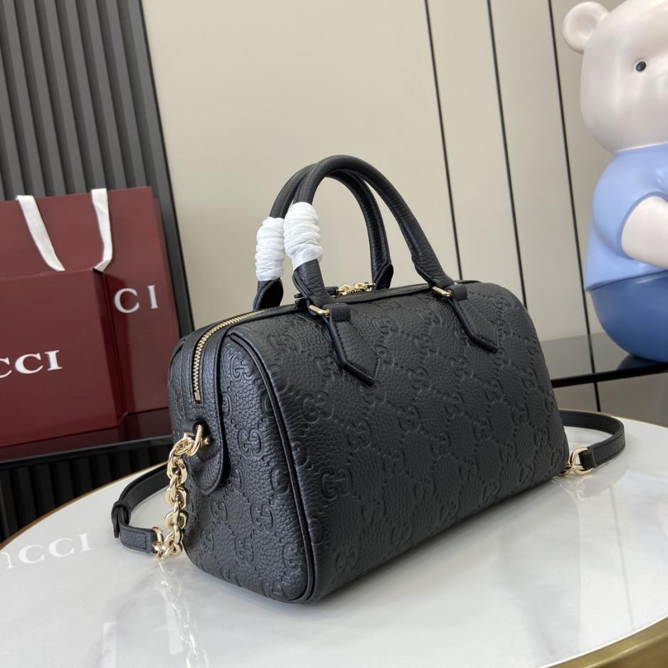 Borsa piccola serie Gucci GG Emblem